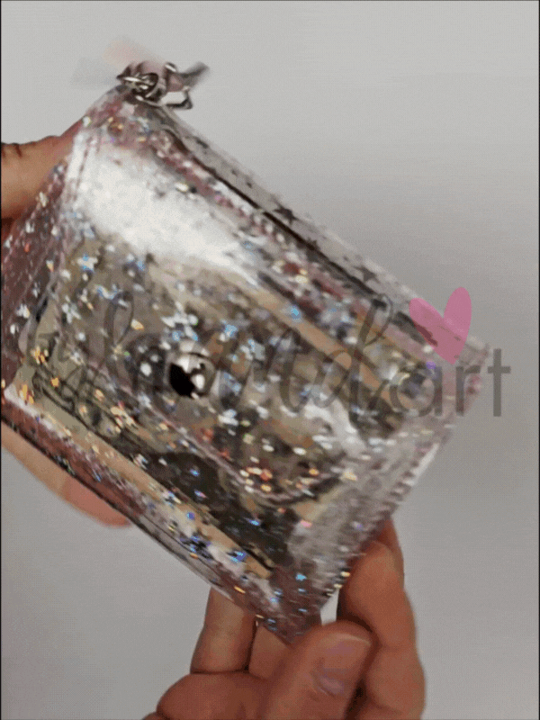 Holo Stars Wallet in holographic sparkled vinyl with star details, silver hardware, swivel hook, and keyring