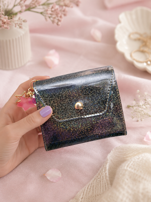 Amber Stardust Wallet in glossy amber vinyl with holographic sparkle and gold-tone hardware