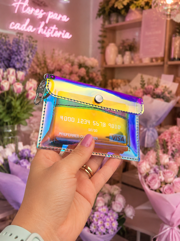 Prismatic Teal Slim Wallet in holographic teal vinyl with snap closure, keyring, and lobster clasp